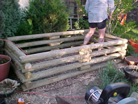 Stacked timber frame, limited to 24" height for strength